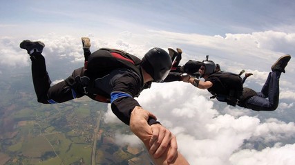 Skydiving friends having fun