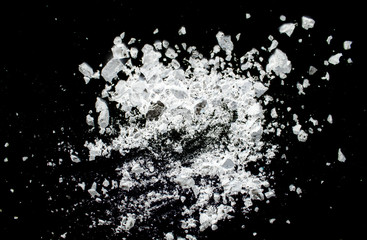 White powder on a black background abstraction
