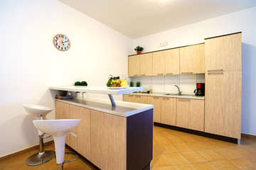 Interior of a kitchen with bar counter in a villa