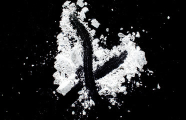 White powder on a black background abstraction
