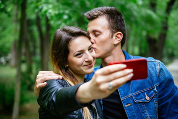 Selfie while kissing her