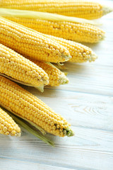 Sweet corn on a blue wooden table