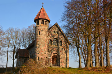 Naklejka premium old stone church i Raszag, Mazury, Poland