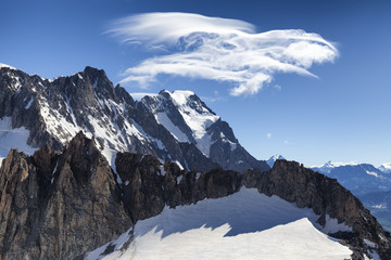 Fototapeta premium Panoramic view of Western alps whit Giant's Tooth (Dent du Geant) from Helbronner roof of europe in Aosta Valley region of Italy.