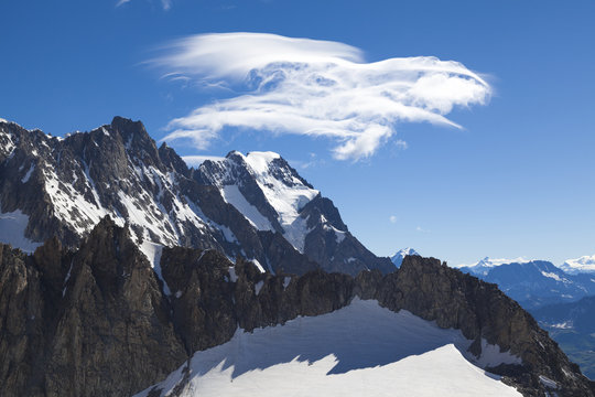 Panoramic view of Western alps whit Giant's Tooth (Dent du Geant) from Helbronner roof of europe in Aosta Valley region of Italy.