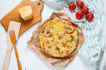 Casserole with mushrooms, zucchini, cherry tomato, cheese