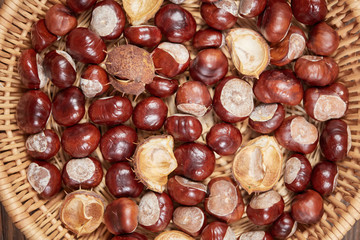 Chestnuts on a wooden table top view