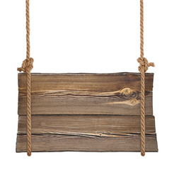 Wooden sign hanging on ropes