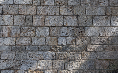 Fototapeta premium Part of the wall in the medieval town of Besalou in Spain
