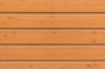 Skandinavische Holzwand in Rotorange - Textur - Hintergrund (historische Altstadt Porvoo, Finnland).