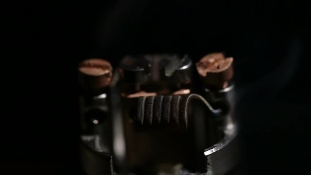 Preheat spiral of clapton coil mounted in the electronic cigarette