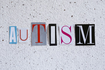 autism word on handmade paper texture