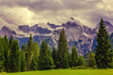 Mountain peak through the clouds