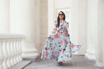 Plus size model in floral dress - Powered by Adobe