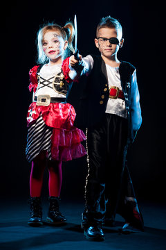 Boy And Girl Dressed As Pirate For Halloween