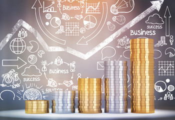 Stacks of coins standing against blackboard with white graph and business icons. Concept of...