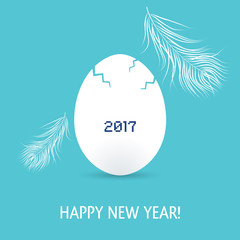 New year card with egg and feathers. The year 2017 of rooster