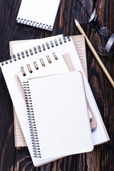 Stack of spiral notebooks