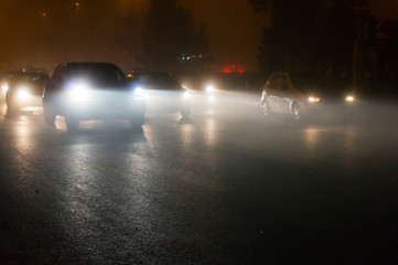 Fototapeta na wymiar Cars in traffic at night