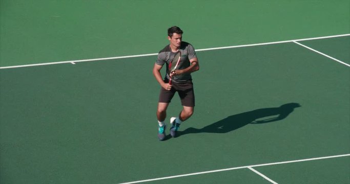 Tennis player returns.