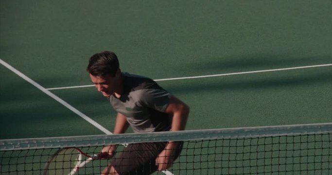 Tennis player returns.