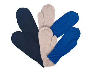 Chunky knit wool mittens separated on white background
