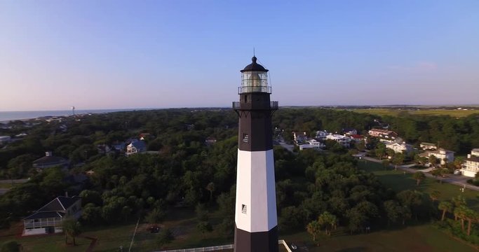 Aerial perspective of the Tybee Island Light Station Lighthouse, flying near the tower.