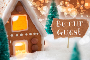Fototapeta na wymiar Gingerbread House, Bronze Background, Text Be Our Guest