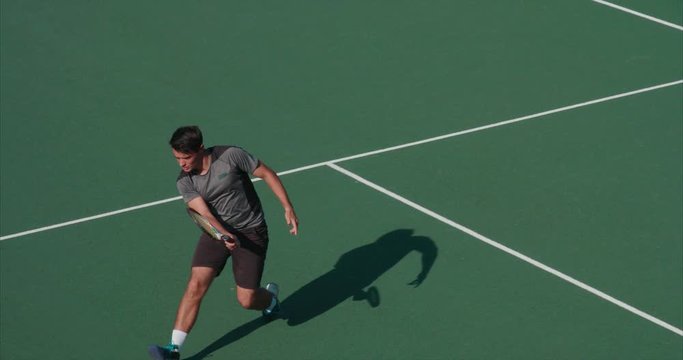 Tennis player returns and celebrates great shot