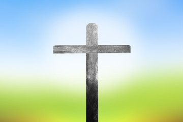 One cross green field