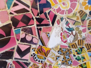 Travel Destination, Barcelona, Spain: Detail of Antonio Gaudi's mosaic art in public art landmark, Park Guell