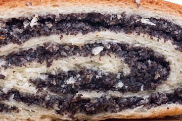 Closeup macro view strudel with poppy seeds