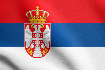 Flag of Serbia waving with fabric texture