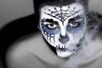 Halloween make up sugar skull Santa Muerte concept.