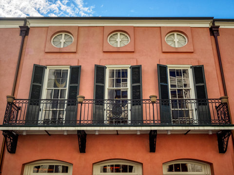 Three Windows and a Balcony in the French Quarter New Orleans