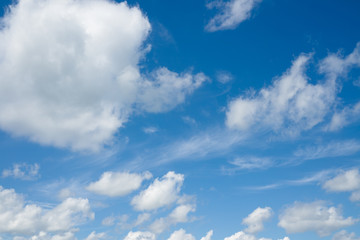 Naklejka na ściany i meble Beautiful white clouds in blue sky.