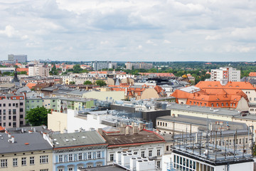 Fototapeta na wymiar Poznan, Poland - June 28, 2016: View on old and modern buildings in polish town Poznan