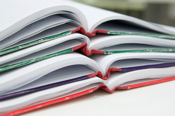 Open of many report book on desk