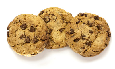 Three crunchy chocolate chips cookies on white