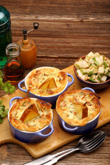 Pears baked in puff pastry with blue cheese and walnuts