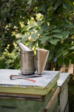 Close-up of bee smoker and equipments