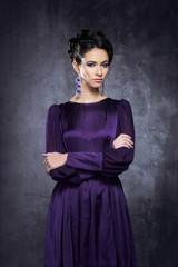Young woman in a beautiful evening dress