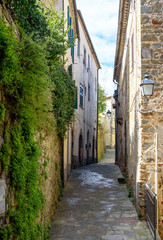 alley of the tuscan village of Scansano, italy