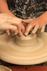 working on spinning wheel