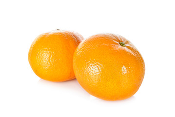 whole ripe orange on white background