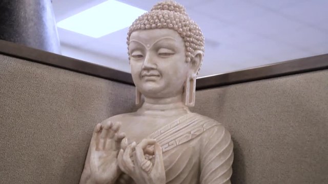 Buddha statue in an office