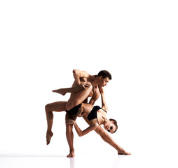 Couple of sporty ballet dancers in art performance.