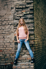 beautiful young girl posing on the street