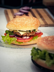 Finished hamburgers on the plate. Cooking burger concept