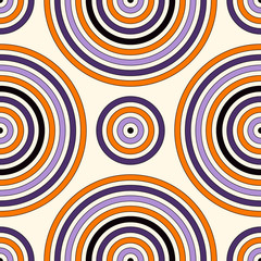 Seamless pattern in Halloween traditional colors. Abstract background with bright round vortexes.